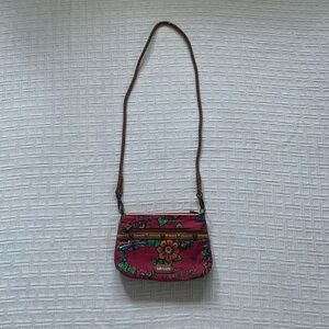 Sakroots red floral canvas purse.